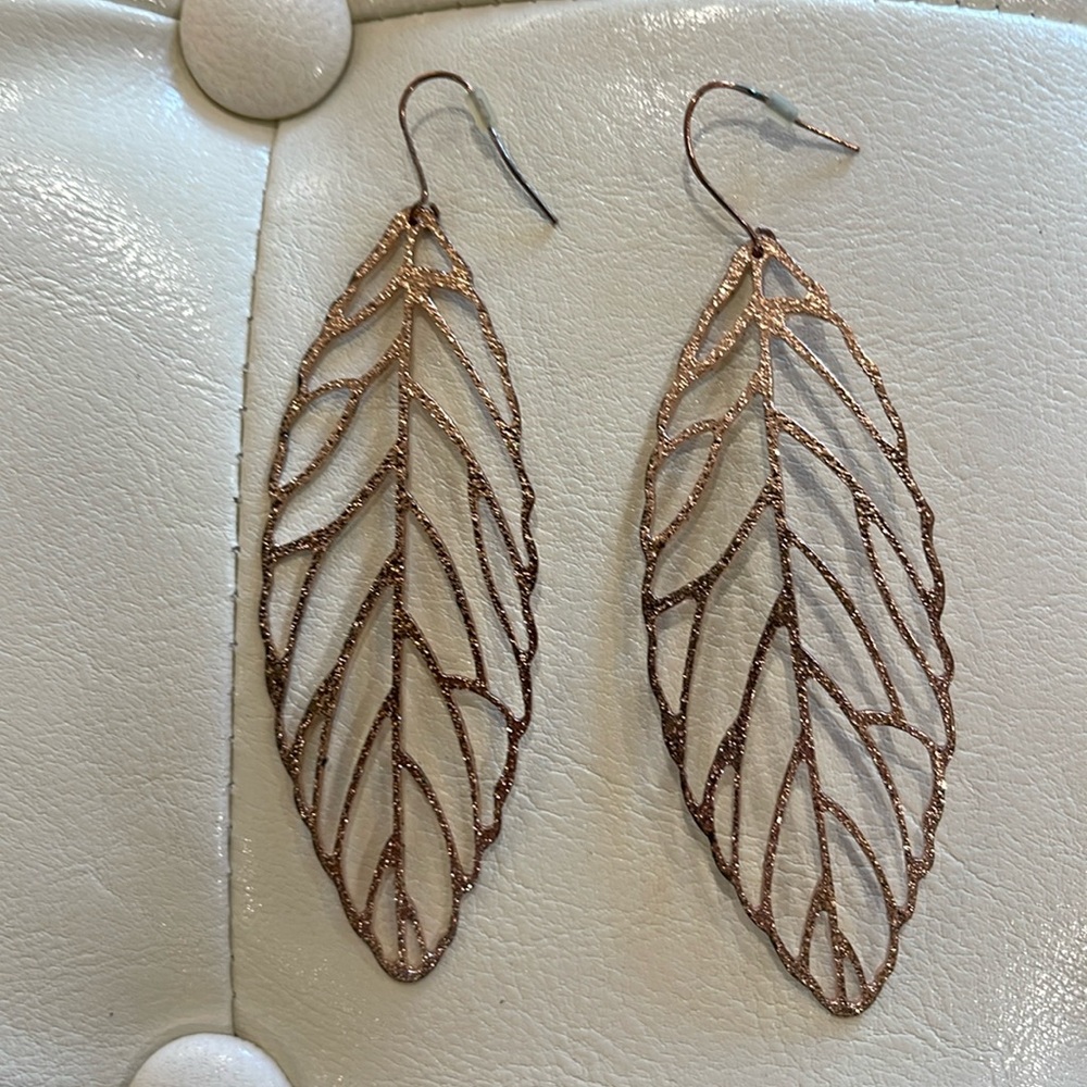 Gold toned leaf earrings